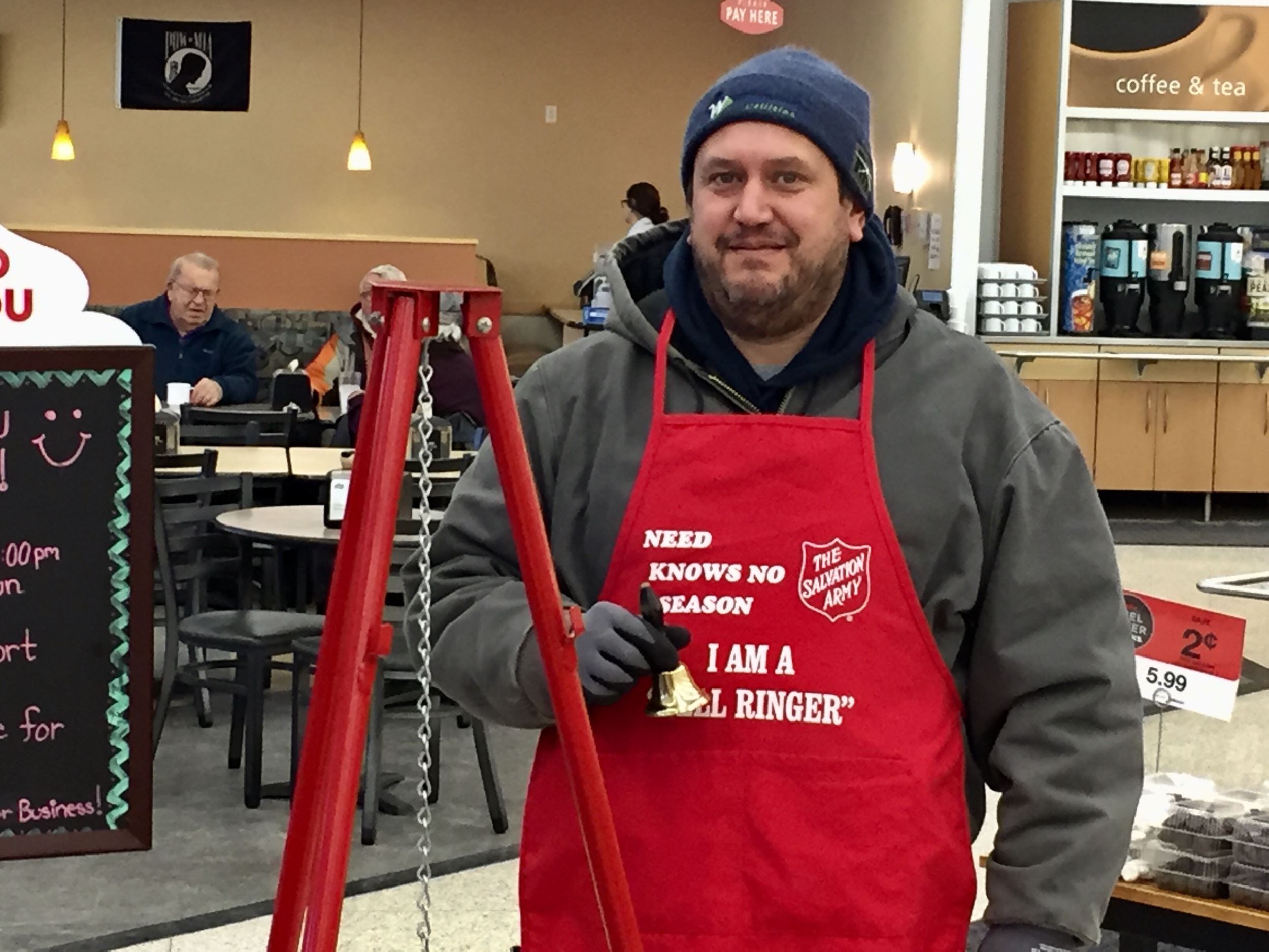 Greg Brase ringing the bell for the Salvation Army