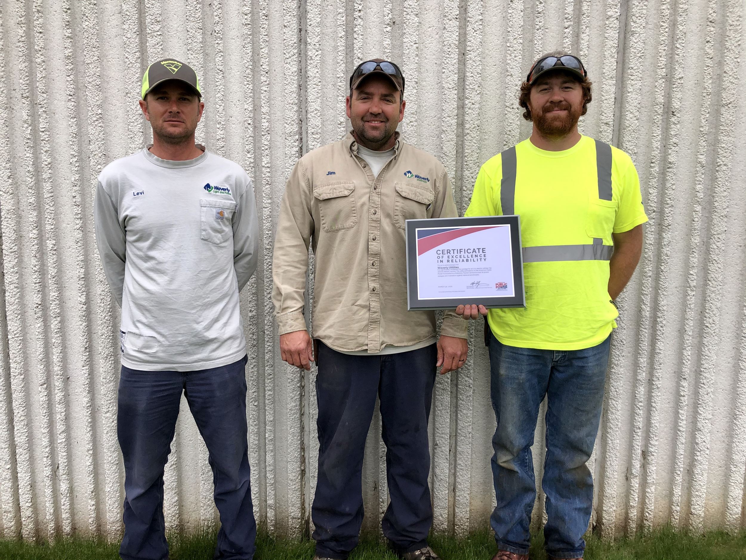 Levi Gulick, Jim Baumgartner, and Shawn Miller, with the reliability award